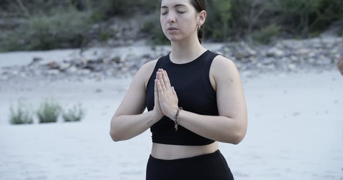 A serene yoga session on a Bali beach, capturing tranquility and mindfulness.