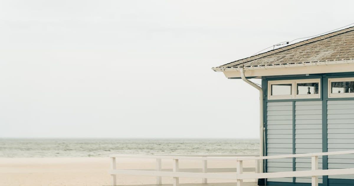 Tranquil view of a beach hut by the Baltic Sea coast in Gdynia, Poland.